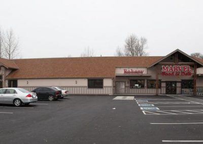 Photo of the building in Tacoma store with parking lot